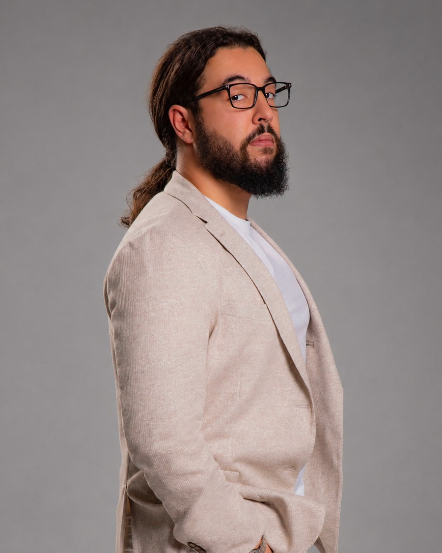 Studio portrait of Ahmed AlSharif